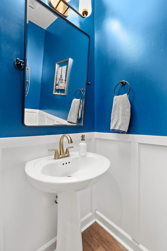 2213 Kirkwall Dr, Nolensville, TN 37135 - bathroom with wainscoting and wood finished floors