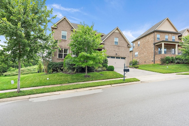 2213 Kirkwall Dr, Nolensville, TN 37135 - traditional-style home with an attached garage, driveway, brick siding, and a front yard