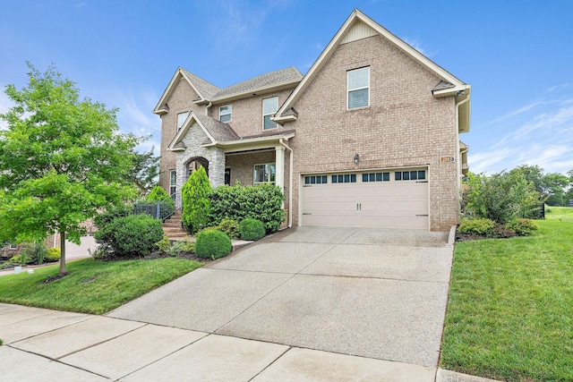 2213 Kirkwall Dr, Nolensville, TN 37135 - traditional-style house with driveway, a garage, brick siding, and a front yard