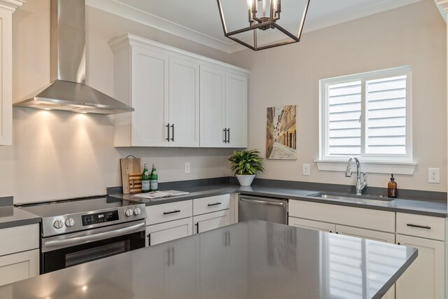 317 Delta Way, La Vergne, TN 37086 - kitchen featuring wall chimney range hood, stainless steel appliances, dark countertops, a chandelier, and white cabinetry