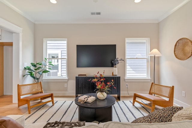 317 Delta Way, La Vergne, TN 37086 - living room with ornamental molding, wood finished floors, healthy amount of natural light, and recessed lighting