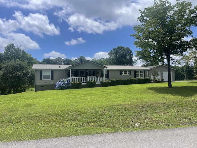 687 County Road 135, Riceville, TN 37370 - view of front of property featuring a porch, a front lawn, and a metal roof