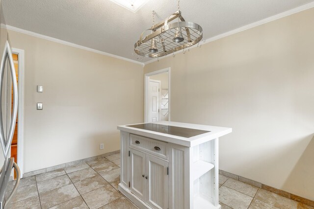 3405 Elder Mountain Rd, Chattanooga, TN 37419 - kitchen with crown molding, white cabinetry, fridge, a kitchen island, and light countertops