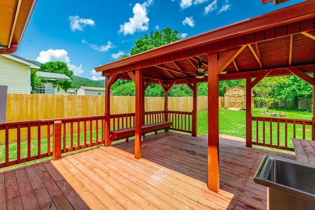 3405 Elder Mountain Rd, Chattanooga, TN 37419 - deck with a shed, a fenced backyard, and ceiling fan