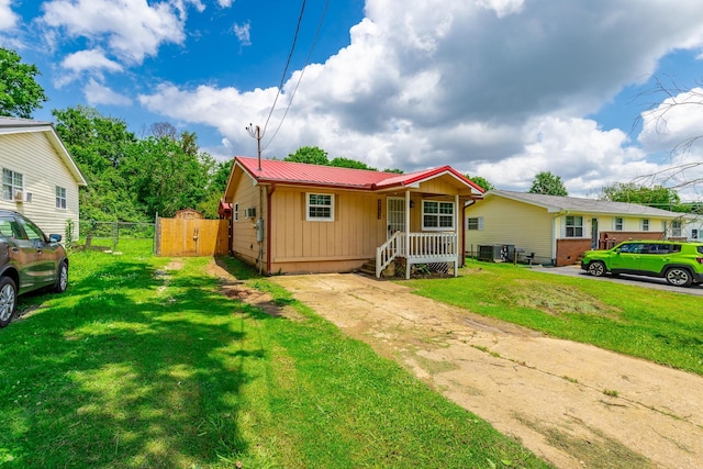 3405 Elder Mountain Rd, Chattanooga, TN 37419 - view of front facade with board and batten siding, a gate, and a metal roof