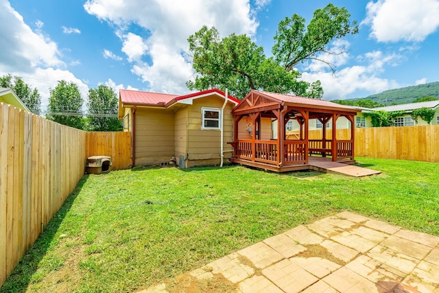 3405 Elder Mountain Rd, Chattanooga, TN 37419 - back of house featuring a gazebo, a fenced backyard, a metal roof, and a deck
