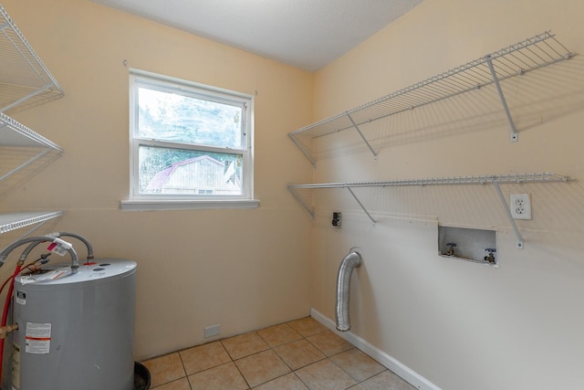 3405 Elder Mountain Rd, Chattanooga, TN 37419 - washroom with washer hookup, light tile patterned floors, and electric water heater