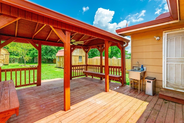 3405 Elder Mountain Rd, Chattanooga, TN 37419 - wooden terrace with a storage unit and a fenced backyard