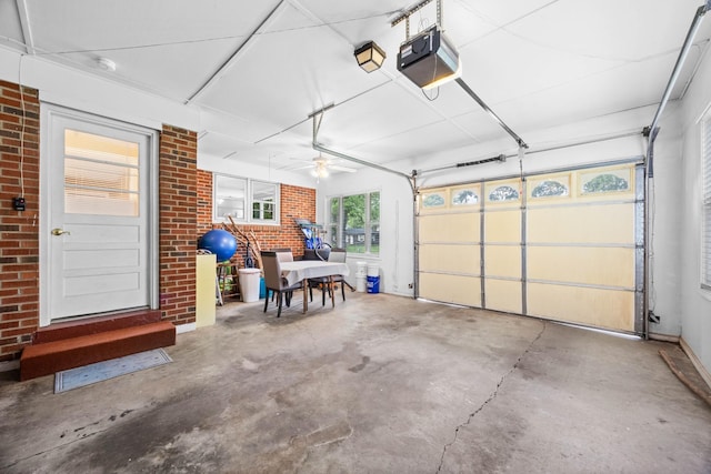 19 Garth Dr, Clarksville, TN 37040 - garage with a garage door opener and ceiling fan