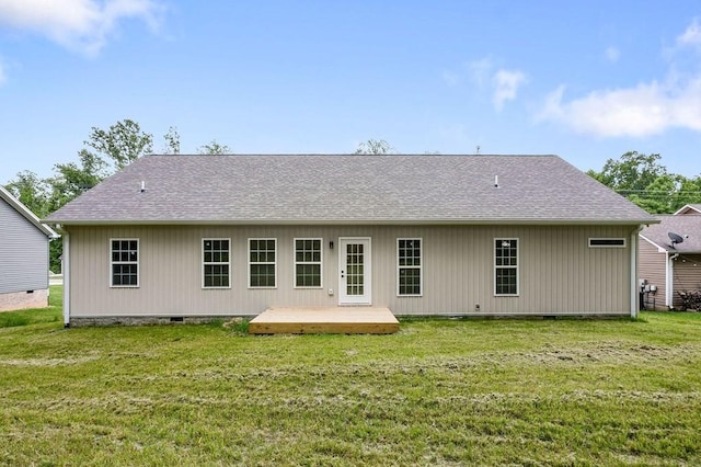 130 Rachelle Pl, Baxter, TN 38544 - back of property featuring crawl space, a lawn, roof with shingles, and a wooden deck