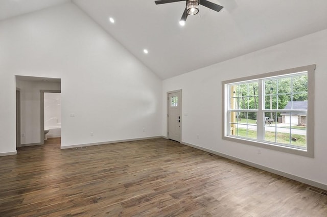 130 Rachelle Pl, Baxter, TN 38544 - unfurnished living room with high vaulted ceiling, a ceiling fan, wood finished floors, and recessed lighting