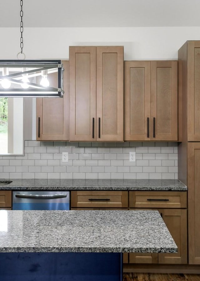 130 Rachelle Pl, Baxter, TN 38544 - kitchen featuring dishwasher, decorative backsplash, and stone countertops