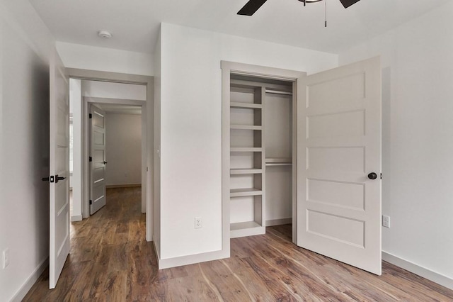 130 Rachelle Pl, Baxter, TN 38544 - unfurnished bedroom featuring wood finished floors, a closet, and a ceiling fan