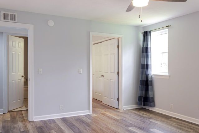 1280 Middle Tennessee Blvd Unit E14, Murfreesboro, TN 37130 - unfurnished bedroom with wood finished floors and a ceiling fan