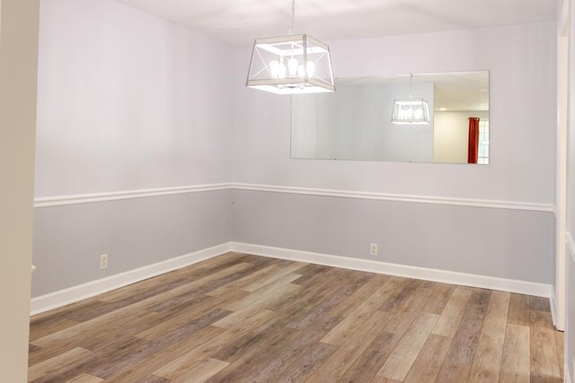 1280 Middle Tennessee Blvd Unit E14, Murfreesboro, TN 37130 - spare room with wood finished floors and baseboards