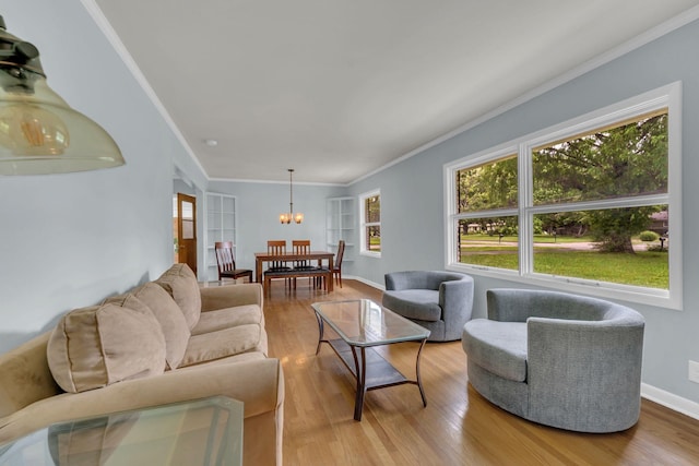 1118 Houston Dr, Murfreesboro, TN 37130 - living area featuring crown molding, a chandelier, and wood finished floors