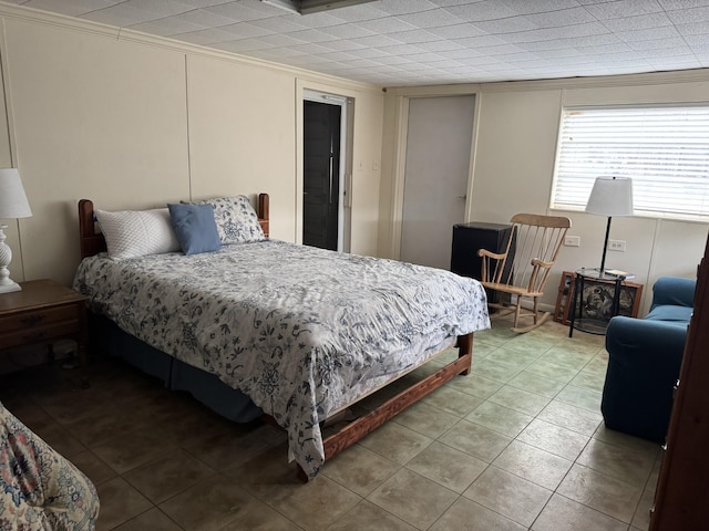 342 Second Creek Rd, Five Points, TN 38457 - bedroom with light tile patterned floors and ornamental molding