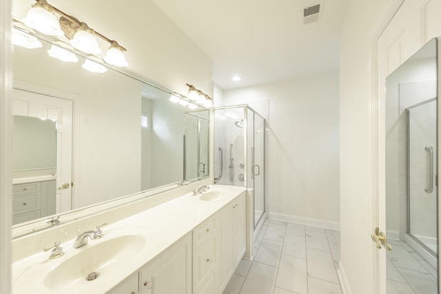 1176 Fairvue Village Ln, Gallatin, TN 37066 - bathroom featuring a stall shower, double vanity, marble finish floors, and recessed lighting