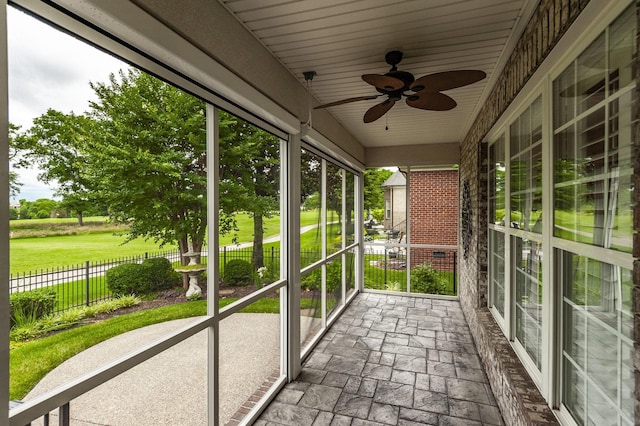 1176 Fairvue Village Ln, Gallatin, TN 37066 - unfurnished sunroom featuring ceiling fan and plenty of natural light