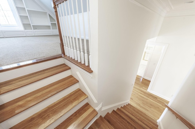 1176 Fairvue Village Ln, Gallatin, TN 37066 - staircase featuring crown molding and wood finished floors