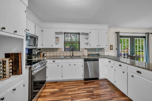 960 Jump Off Rd, Bon Aqua, TN 37025 - kitchen featuring appliances with stainless steel finishes, open shelves, and white cabinetry