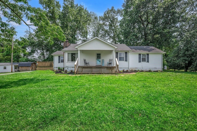 960 Jump Off Rd, Bon Aqua, TN 37025 - view of front of home featuring a chimney, a front lawn, a deck, and a shingled roof