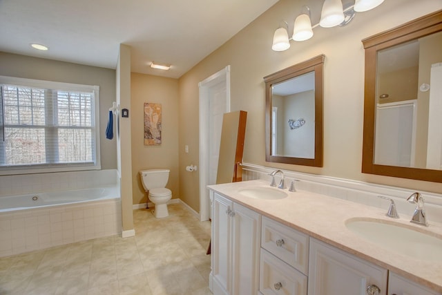 1064 Crane Ct, Kingston Springs, TN 37082 - full bathroom featuring a relaxing tiled tub, double vanity, and tile patterned floors