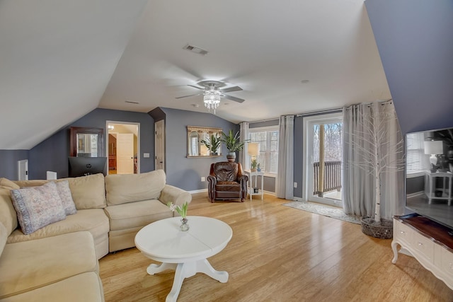 1064 Crane Ct, Kingston Springs, TN 37082 - living area with light wood-type flooring, vaulted ceiling, and a ceiling fan