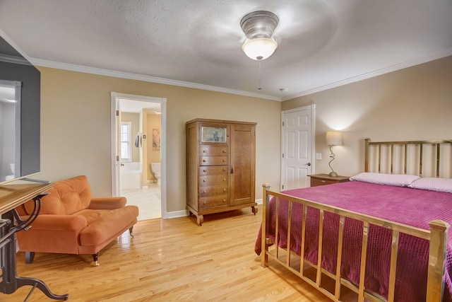 1064 Crane Ct, Kingston Springs, TN 37082 - bedroom featuring light wood finished floors, ornamental molding, connected bathroom, and a ceiling fan