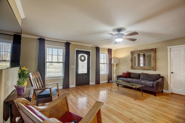 1064 Crane Ct, Kingston Springs, TN 37082 - foyer featuring plenty of natural light, ceiling fan, light wood finished floors, and ornamental molding