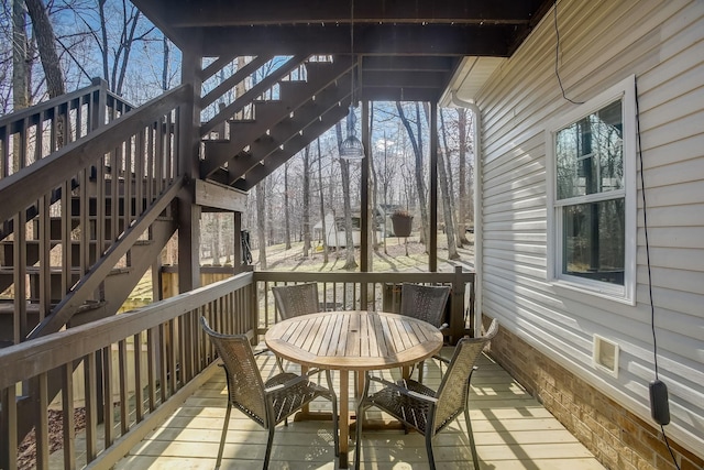 1064 Crane Ct, Kingston Springs, TN 37082 - wooden deck with stairs and outdoor dining area