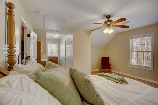 1064 Crane Ct, Kingston Springs, TN 37082 - bedroom with attic access, wood finished floors, a closet, vaulted ceiling, and a ceiling fan