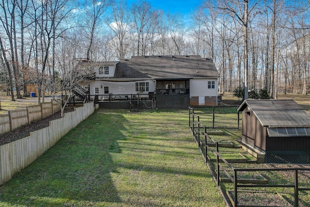 1064 Crane Ct, Kingston Springs, TN 37082 - view of yard featuring a deck and an outbuilding