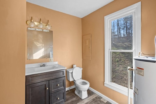 120 Dove Ln, Monroe, TN 38573 - half bathroom featuring water heater, electric panel, vanity, wood finished floors, and healthy amount of natural light