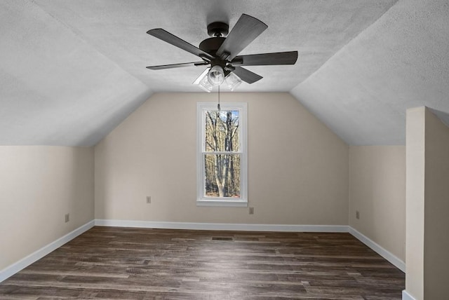 120 Dove Ln, Monroe, TN 38573 - bonus room featuring wood finished floors, ceiling fan, lofted ceiling, and a textured ceiling