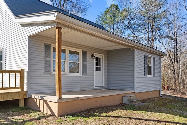 120 Dove Ln, Monroe, TN 38573 - entrance to property with covered porch and a metal roof