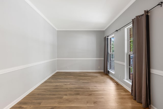 1220 Kelly Ct, Franklin, TN 37064 - spare room with wood finished floors and crown molding