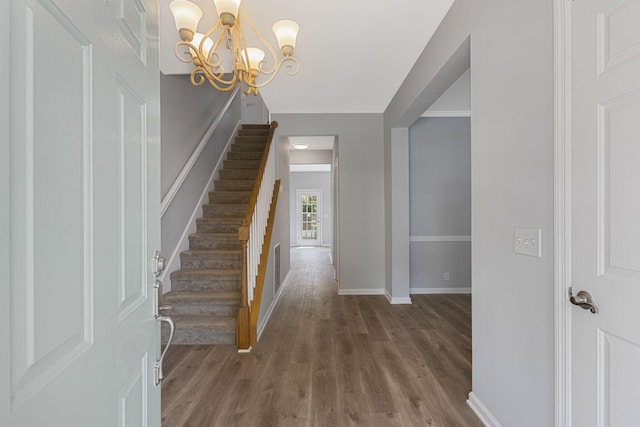 1220 Kelly Ct, Franklin, TN 37064 - entrance foyer featuring a chandelier, wood finished floors, and stairs