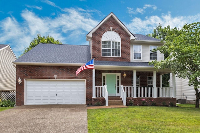 1220 Kelly Ct, Franklin, TN 37064 - view of front facade with concrete driveway, brick siding, and a garage