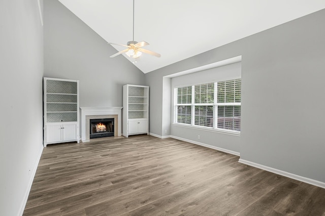 1220 Kelly Ct, Franklin, TN 37064 - unfurnished living room with a ceiling fan, high vaulted ceiling, wood finished floors, and a high end fireplace