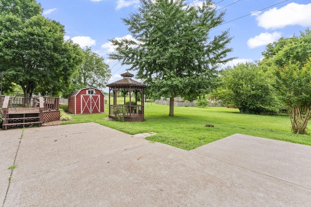 2709 Emery Dr, Nashville, TN 37214 - view of grassy yard with a deck, a storage unit, a patio area, and a gazebo