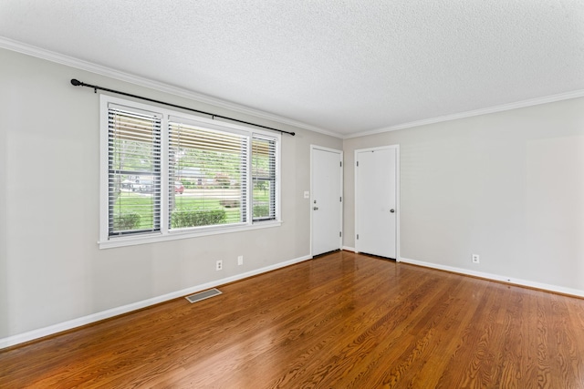 2709 Emery Dr, Nashville, TN 37214 - unfurnished room with a textured ceiling, wood finished floors, and ornamental molding