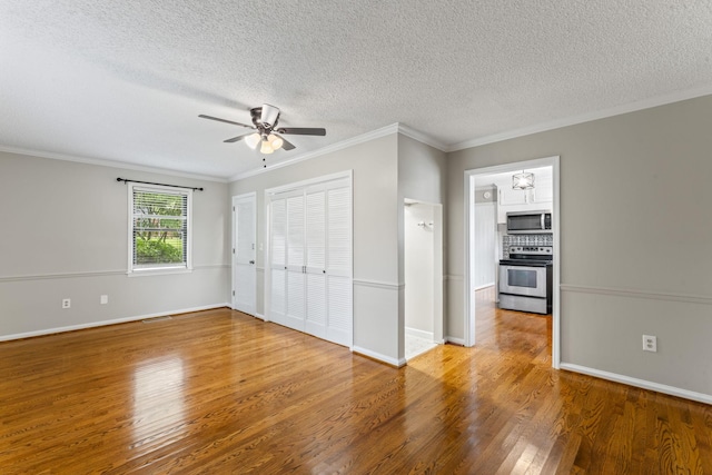 2709 Emery Dr, Nashville, TN 37214 - unfurnished bedroom with wood finished floors, ornamental molding, a textured ceiling, and ceiling fan