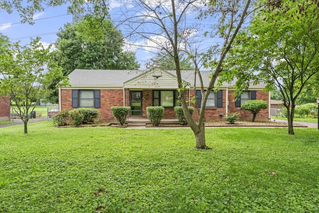 2709 Emery Dr, Nashville, TN 37214 - ranch-style house featuring a front lawn, brick siding, and a shingled roof