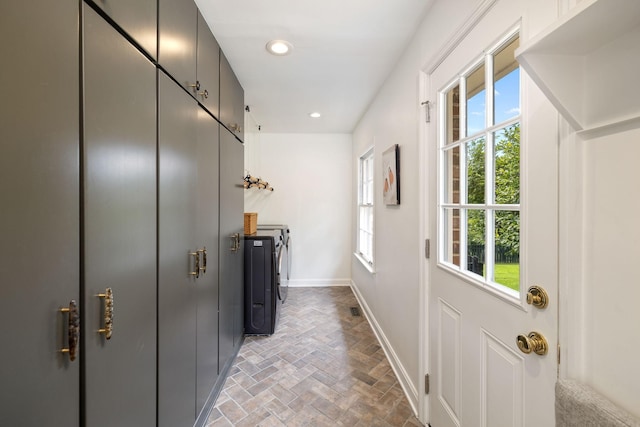 1231 Carl Seyfert Memorial Dr, Brentwood, TN 37027 - laundry area featuring independent washer and dryer, brick floors, and recessed lighting