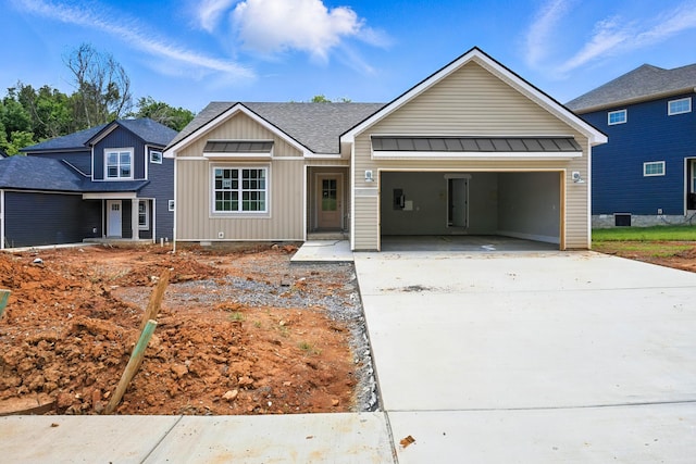2670 Scott Dr, Clarksville, TN 37042 - view of front of home with board and batten siding, driveway, and a garage