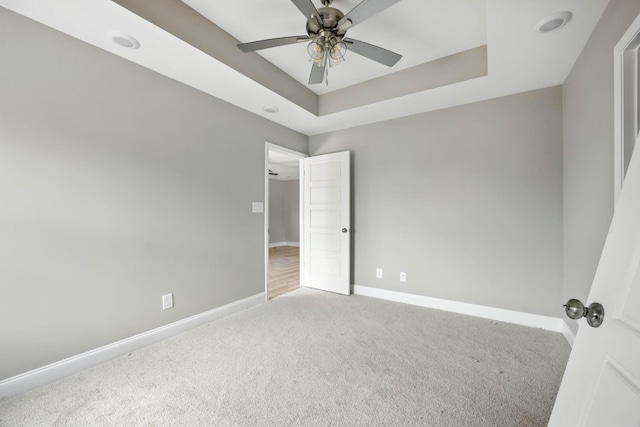2670 Scott Dr, Clarksville, TN 37042 - carpeted empty room featuring ceiling fan and a raised ceiling
