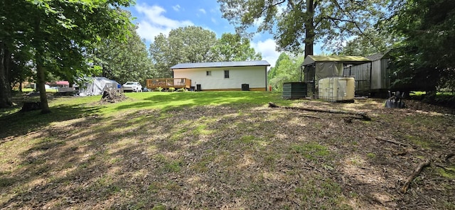 60 Jayson St, Camden, TN 38320 - view of grassy yard with a deck