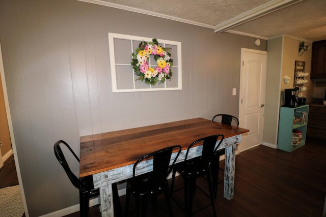 60 Jayson St, Camden, TN 38320 - dining space featuring wood finished floors, a textured ceiling, and crown molding