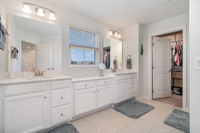 468 Rosy Dale Dr, Gallatin, TN 37066 - bathroom featuring double vanity, a walk in closet, and tile patterned floors